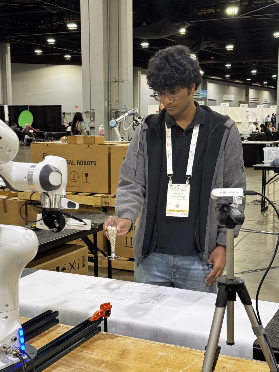 RGMC 10 at ICRA 2025: Atlanta , USA - Team member testing manipulation task with real robot hardware