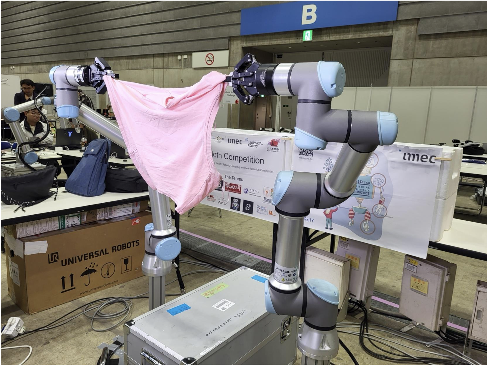 RGMC 9 at ICRA 2024: Cloth manipulation track - Universal Robots performing fabric folding demonstration